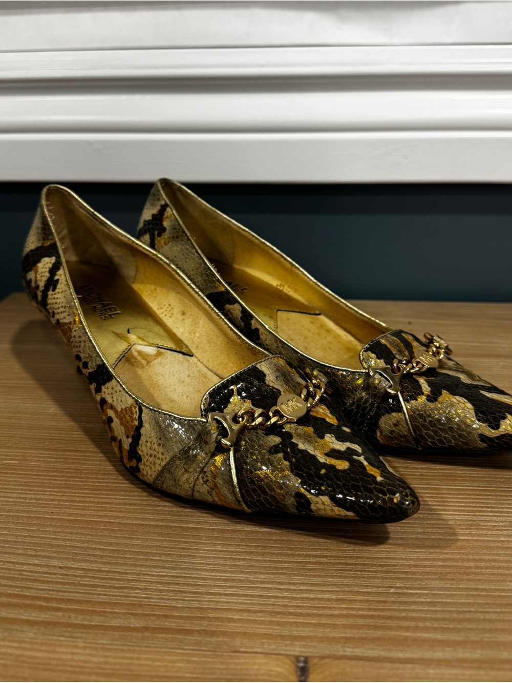 MICHAEL Michael Kors Snake-Print Pointed Flats in Black and Gold
